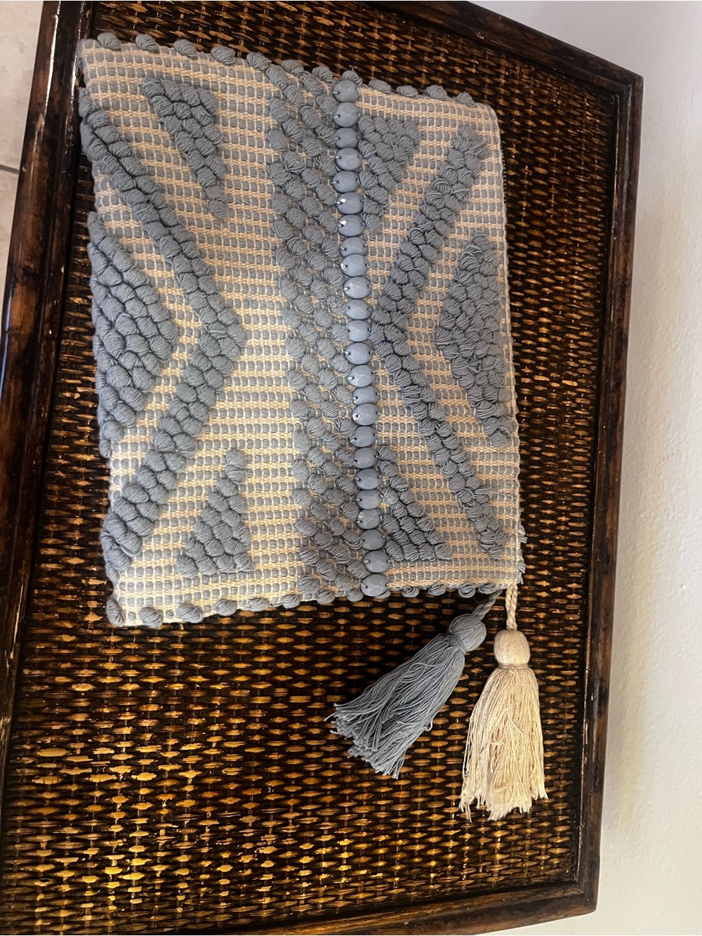 Textured Gray and Cream Woven Tassel Clutch